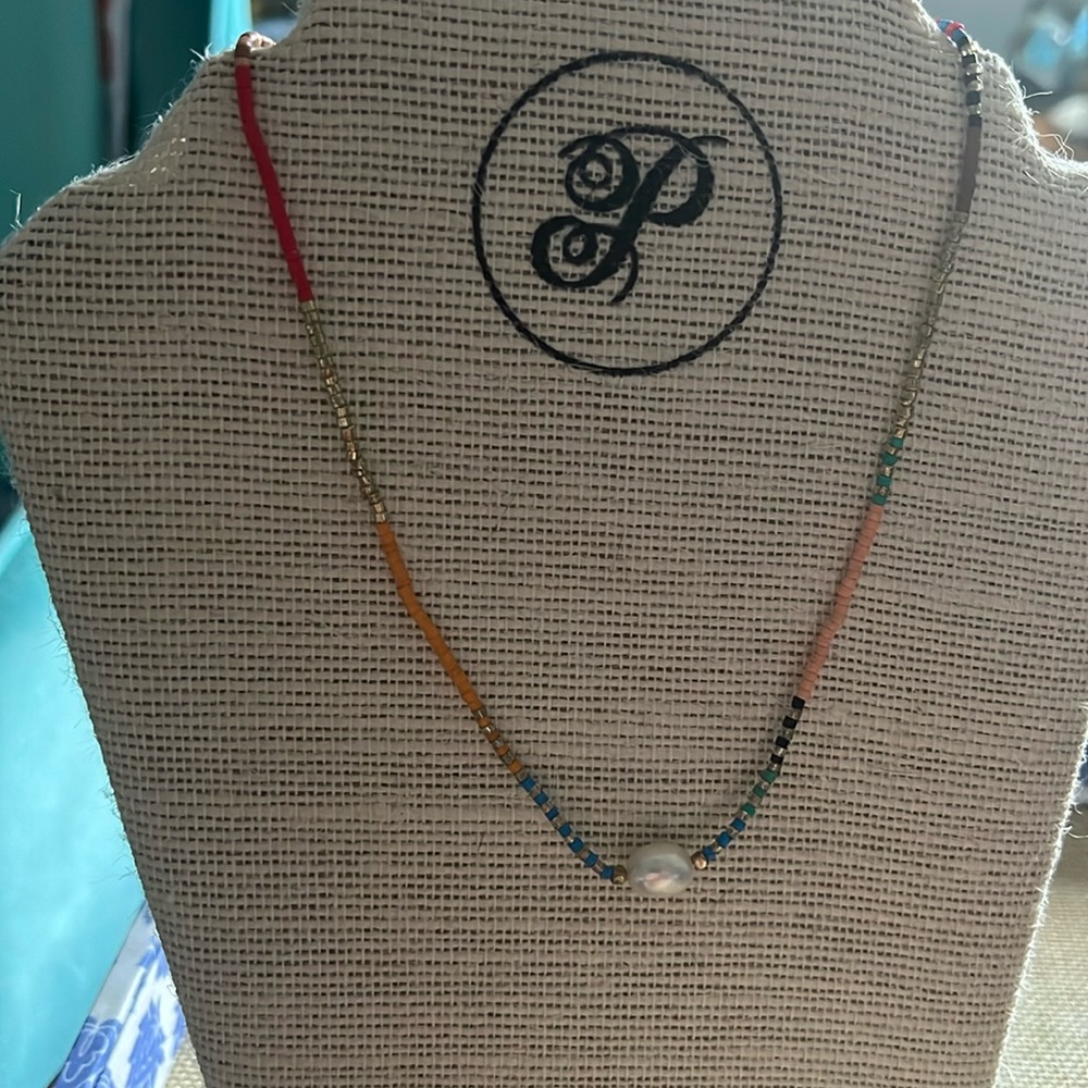 BNIB Beautiful “Savanna” colorful necklace with a single pearl
